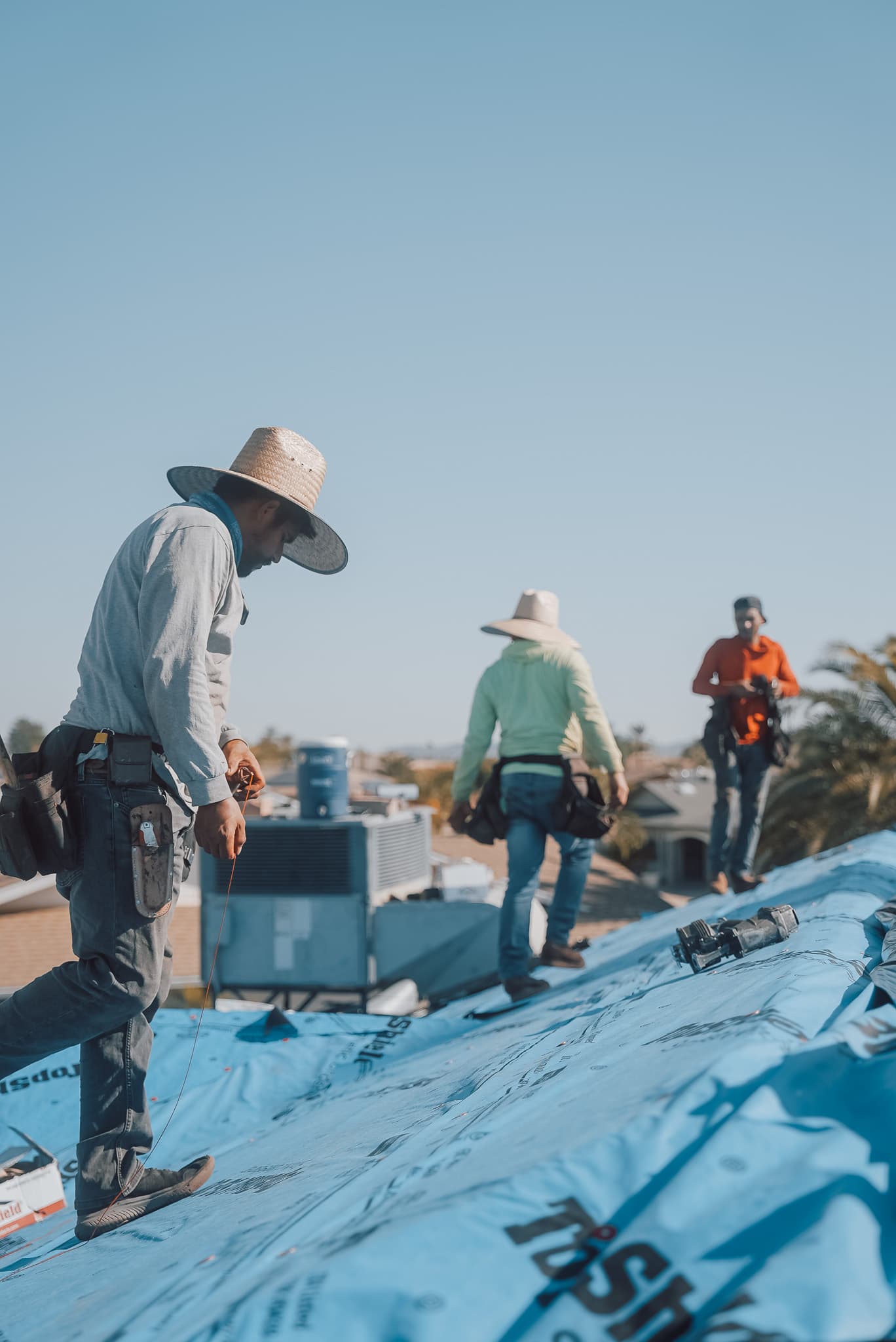 HailCo Roofing crew on an active Phoenix Valley residential install