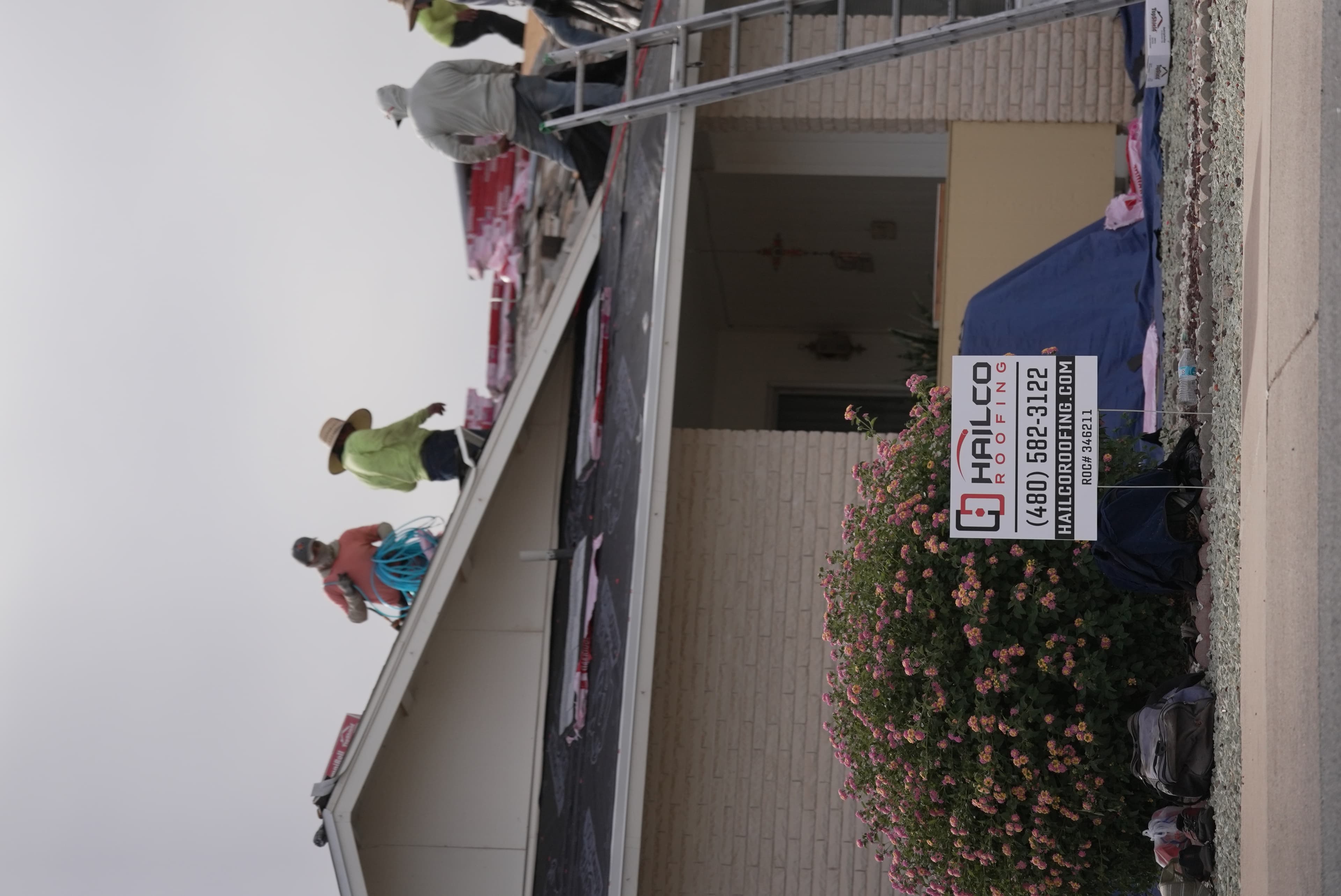 Active HailCo Roofing job site in Scottsdale Arizona with posted City of Scottsdale building permit during a residential roof replacement