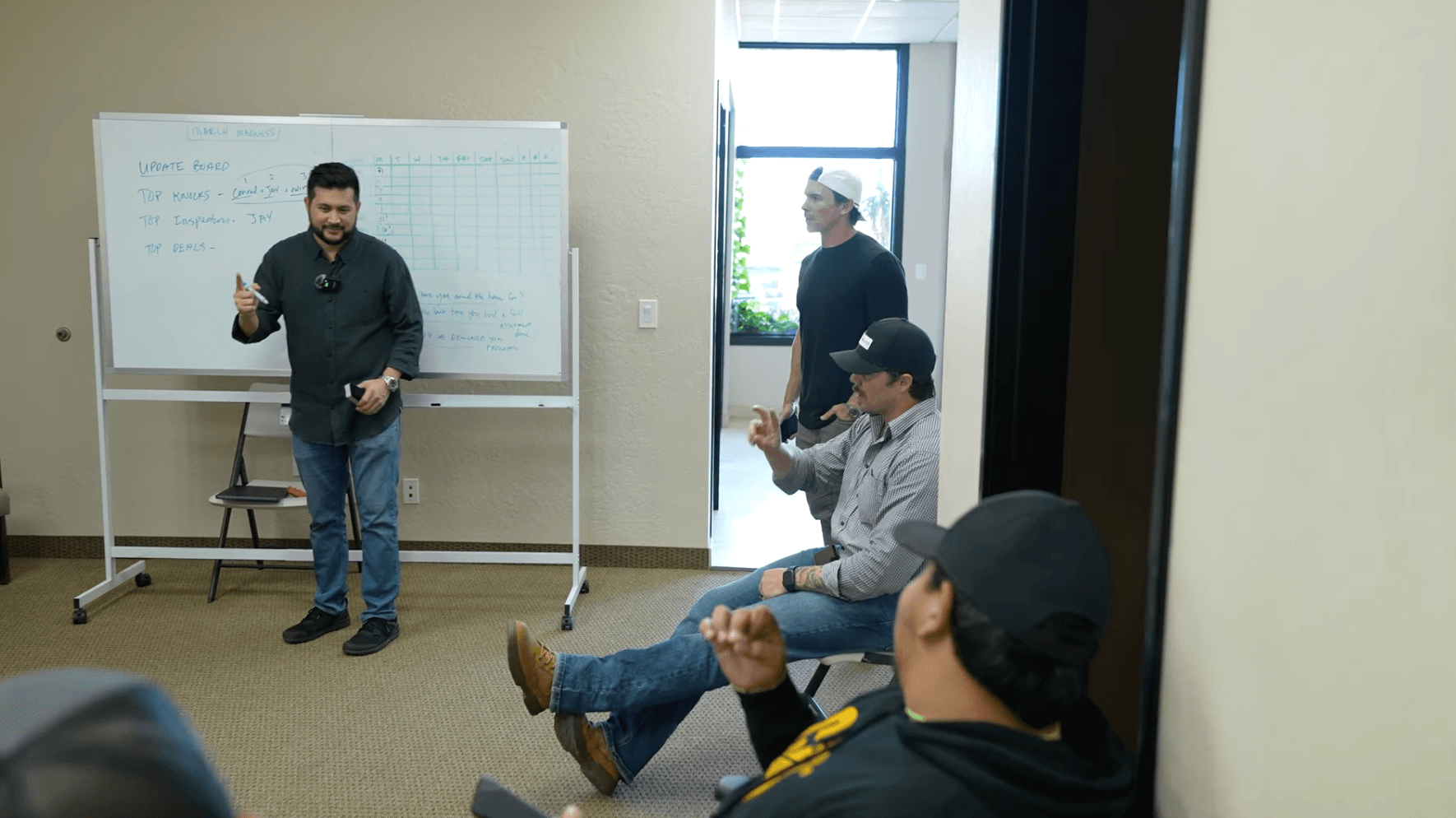 HailCo owners and crew reviewing scope at the Scottsdale office