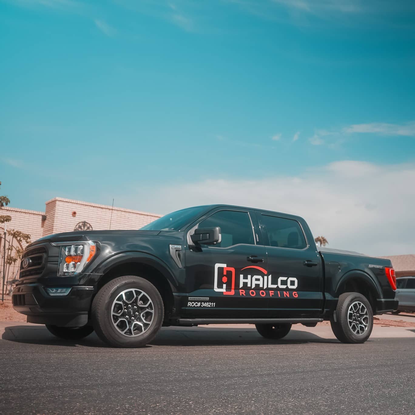 HailCo Roofing foam roof recoat on a Mesa, AZ flat-section East Valley property